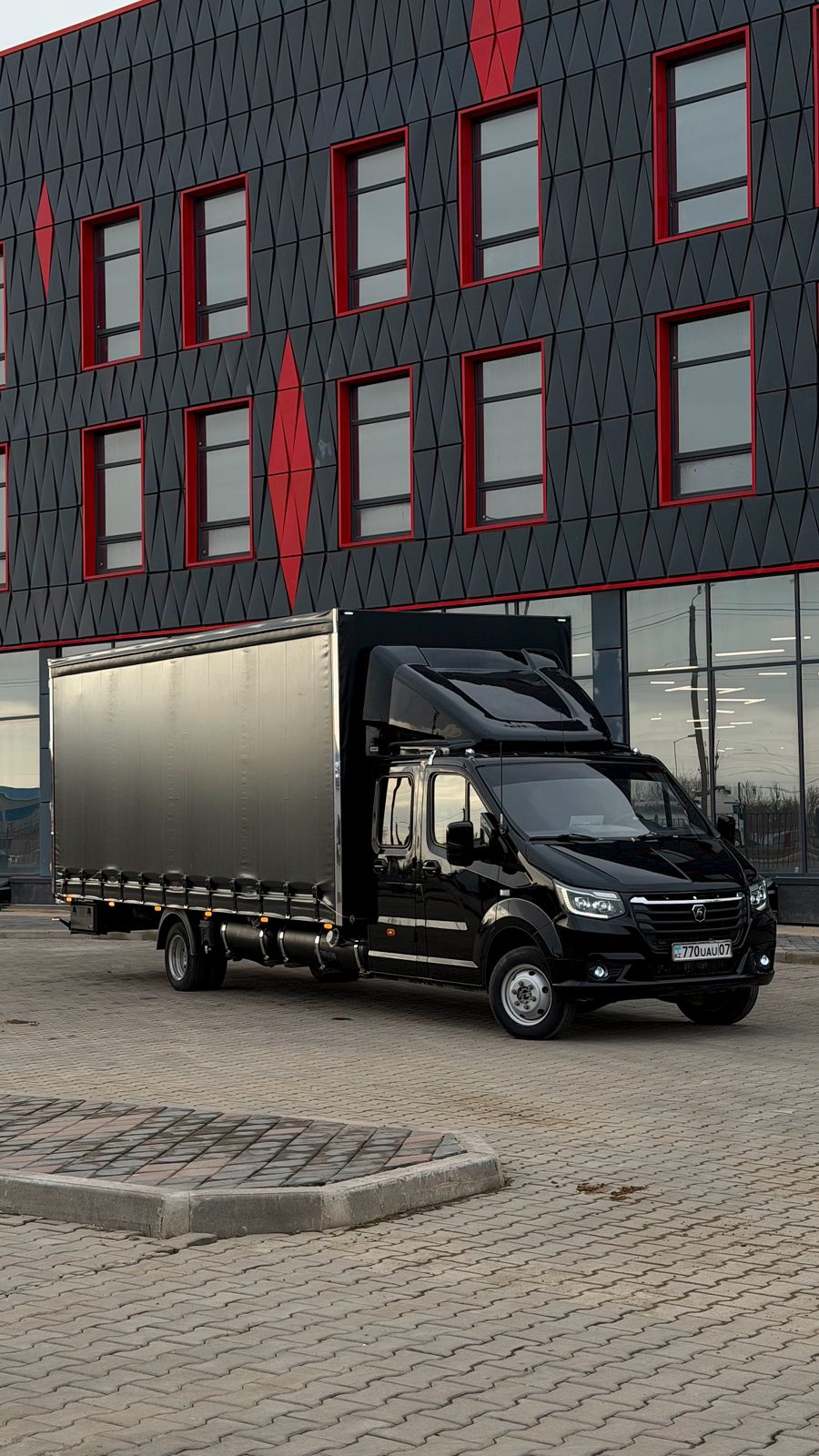 Газель NEXT KazBeketLogistics — вид сбоку